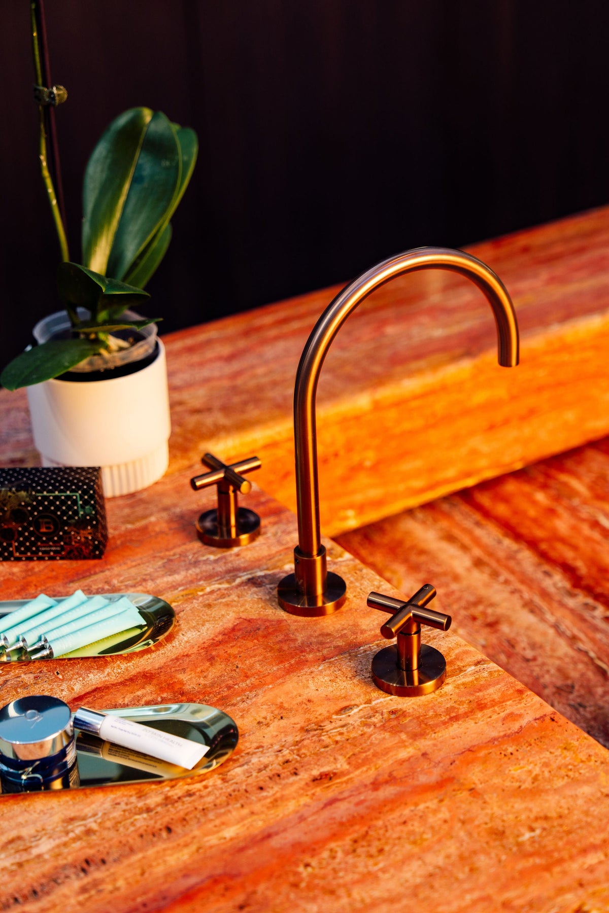 Stone basin and brass details inside FutureSkin